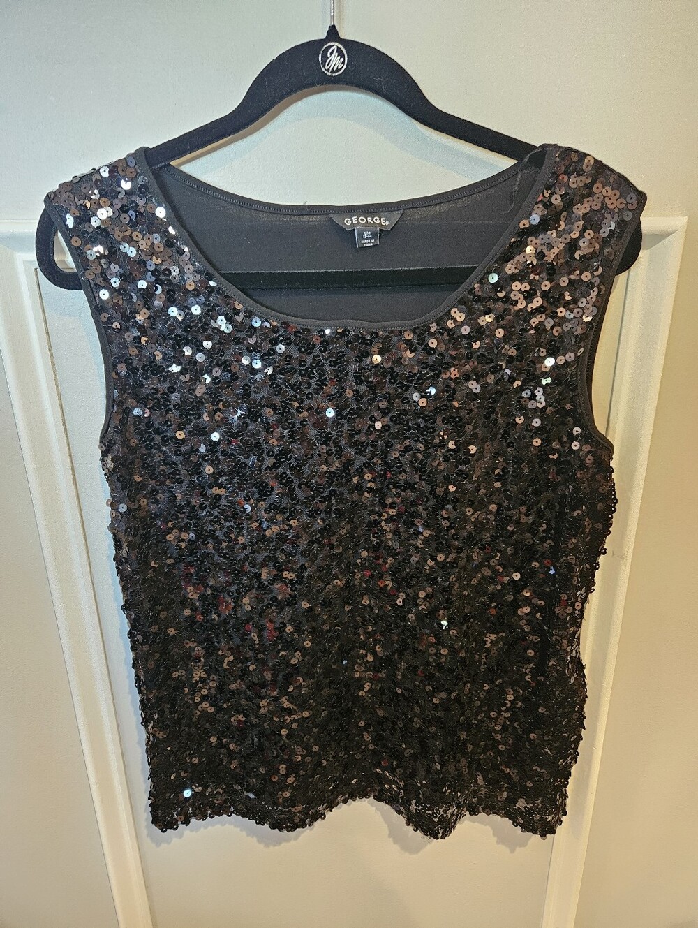 George black sequined sleeveless top.  Size large 12-14.